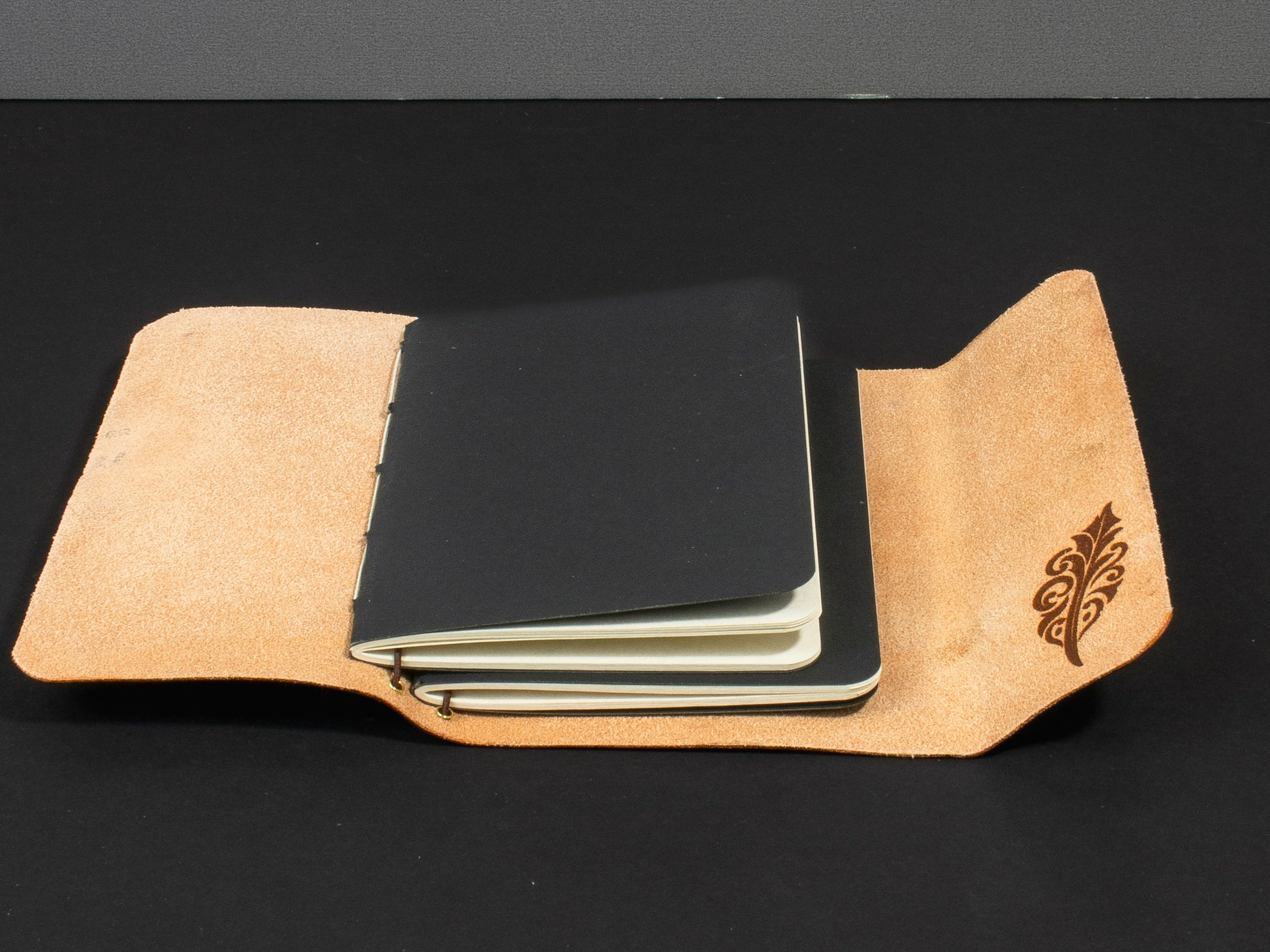 Vegetable-tanned leather journal with refillable inserts