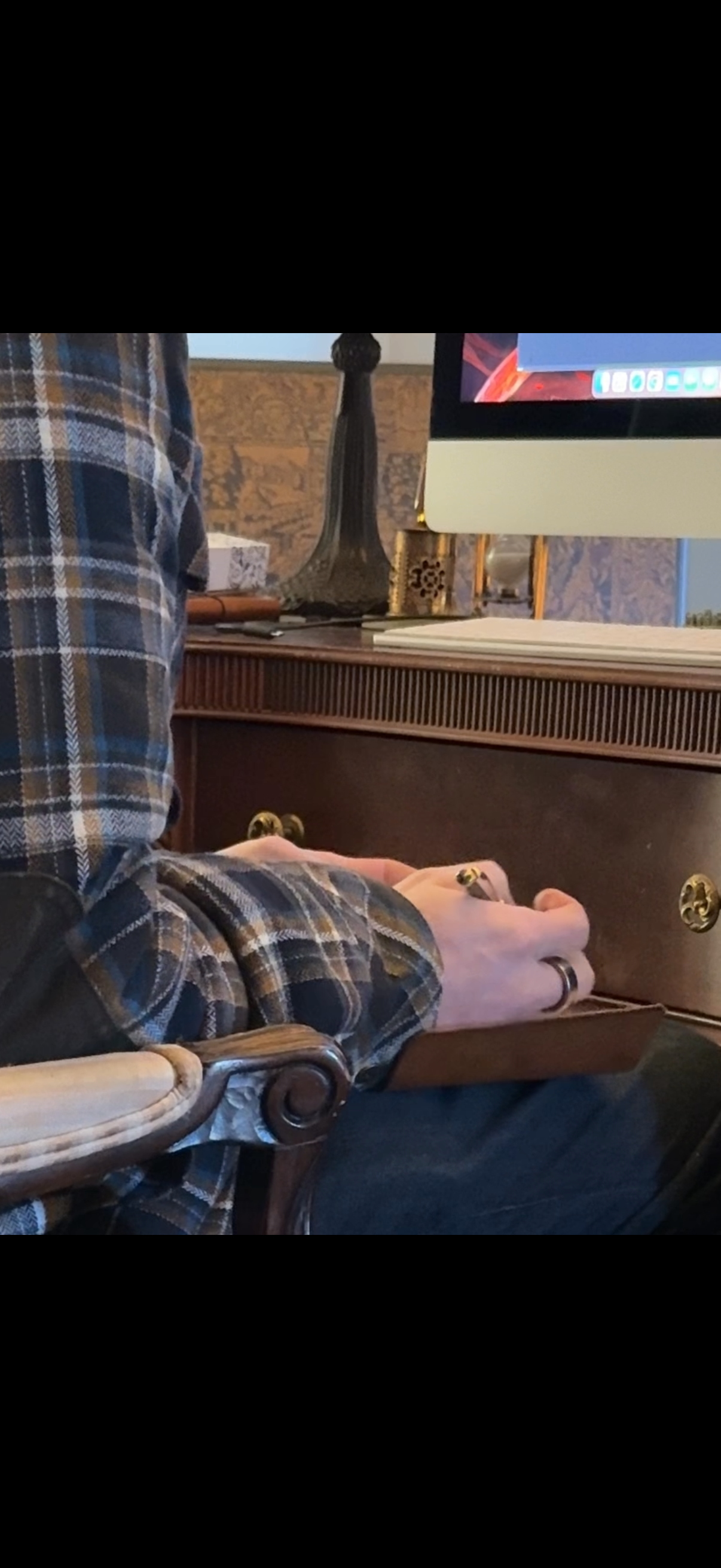 Leather journal being used for writing during daily work, designed for everyday carry